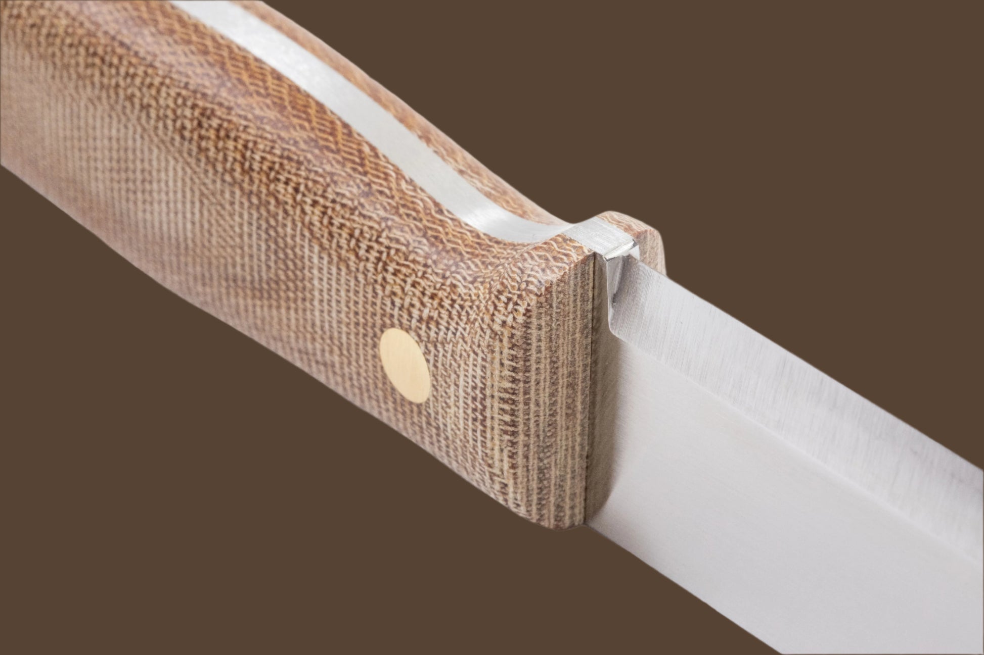 Close up of the canvas micarta handle of the Lars Fält survival knife