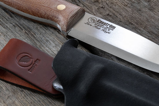Casström Lars Fält knife close up - canvas micarta handle, A8Mod steel, and Kydex sheath