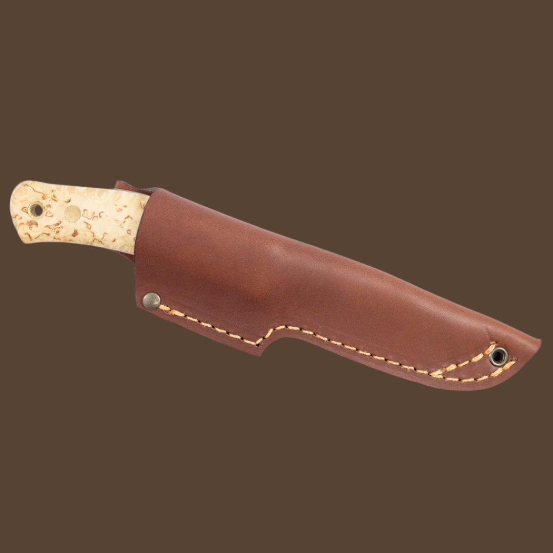 Casström No.10 SFK with curly birch handle, scandi grind and stainless steel blade. The knife is in a cognac brown leather sheath