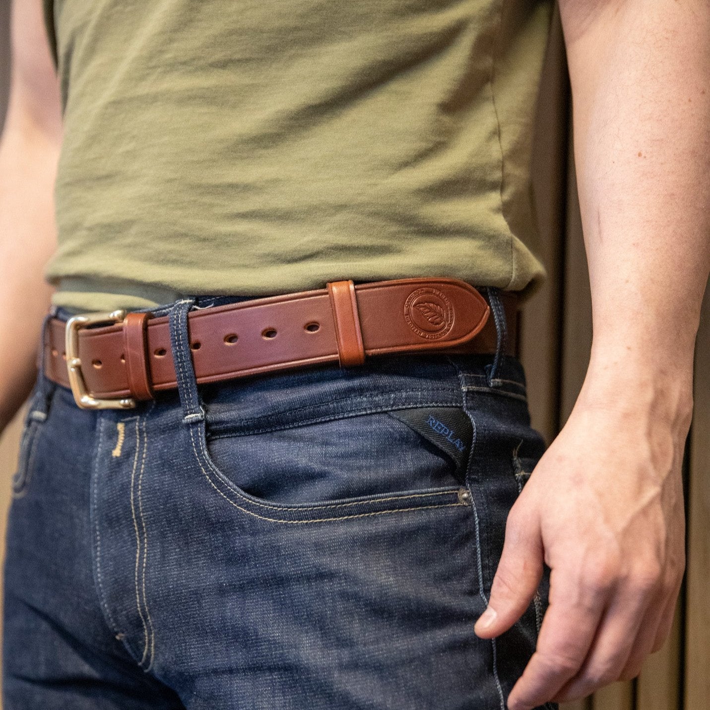 Casström leather belt on a pair of jeans