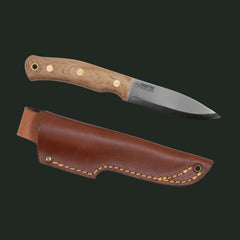 Studio image of the Casström No.10 Swedish Forest Knife with Canvas Micarta handle and standard leather sheath on a white background.