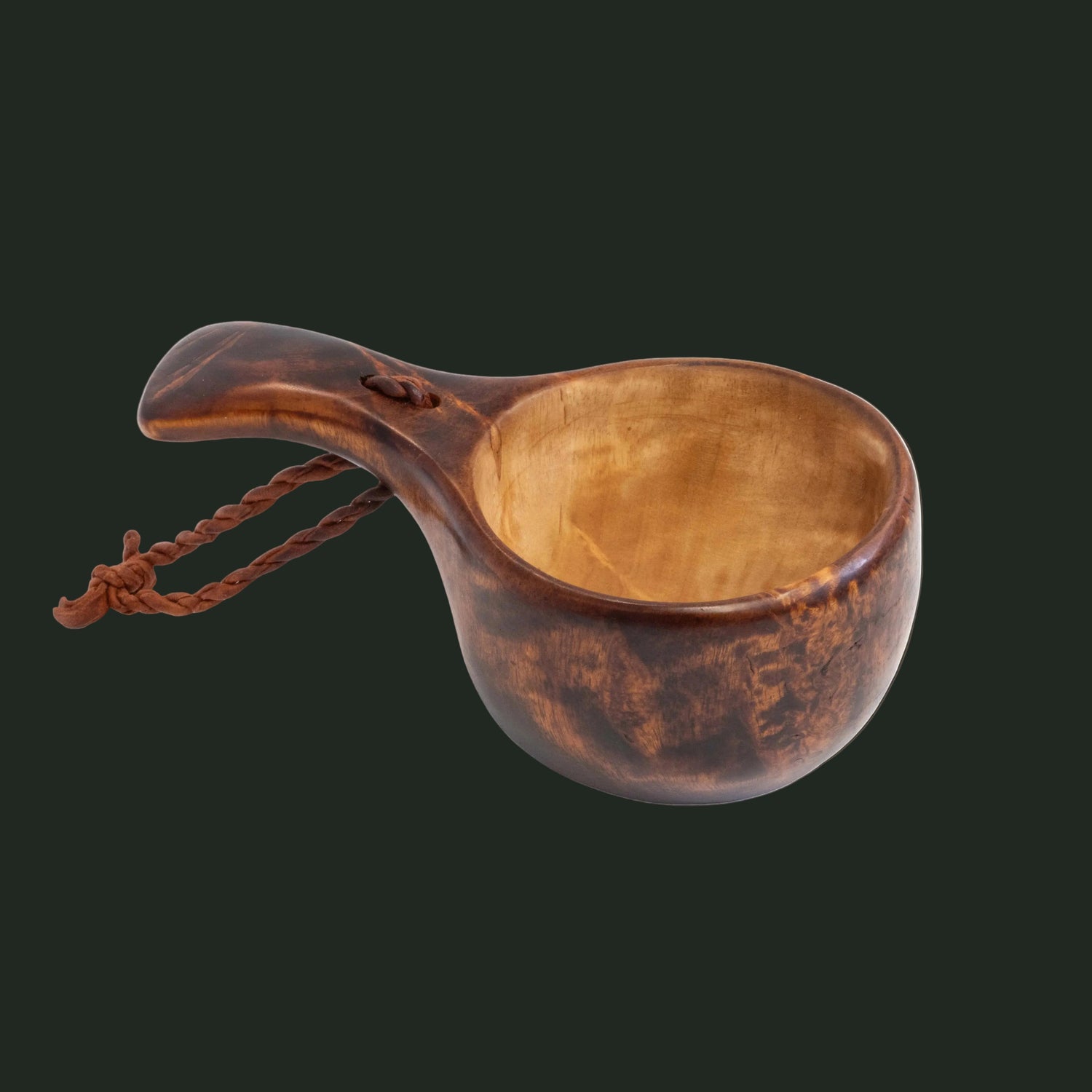 studio image of the Casström Järv kuksa, in stained curly birch