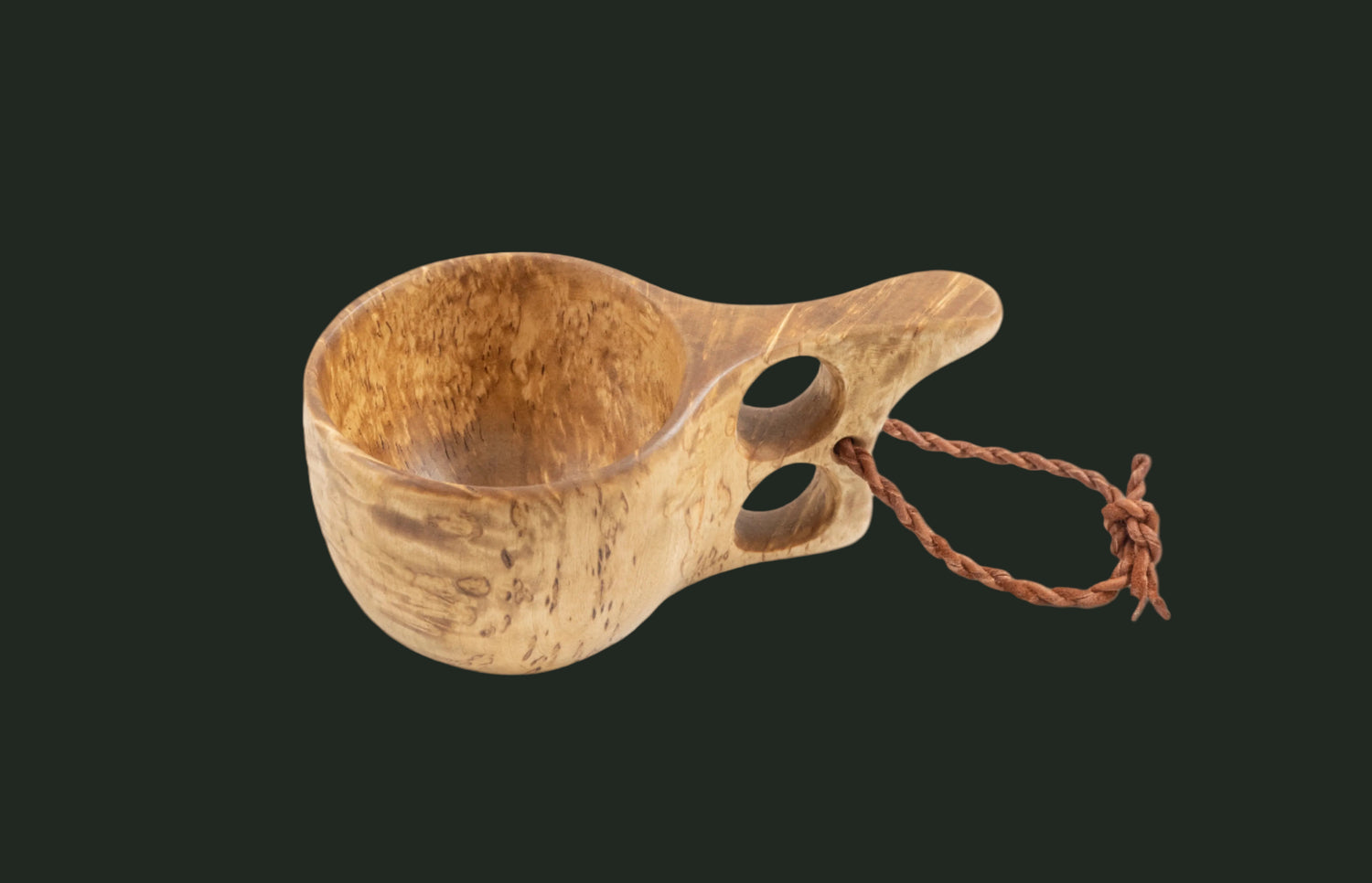 Handcrafted wooden kuksa displaying inside of cup and natural birch wood pattern