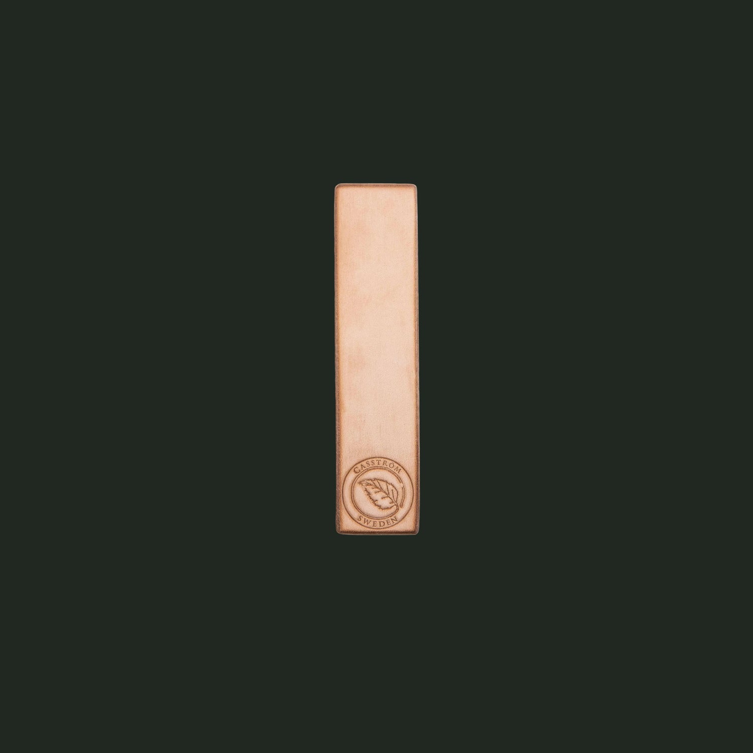 Studio image of the handcrafted Casström Field Strop leather knife strop on a white background.