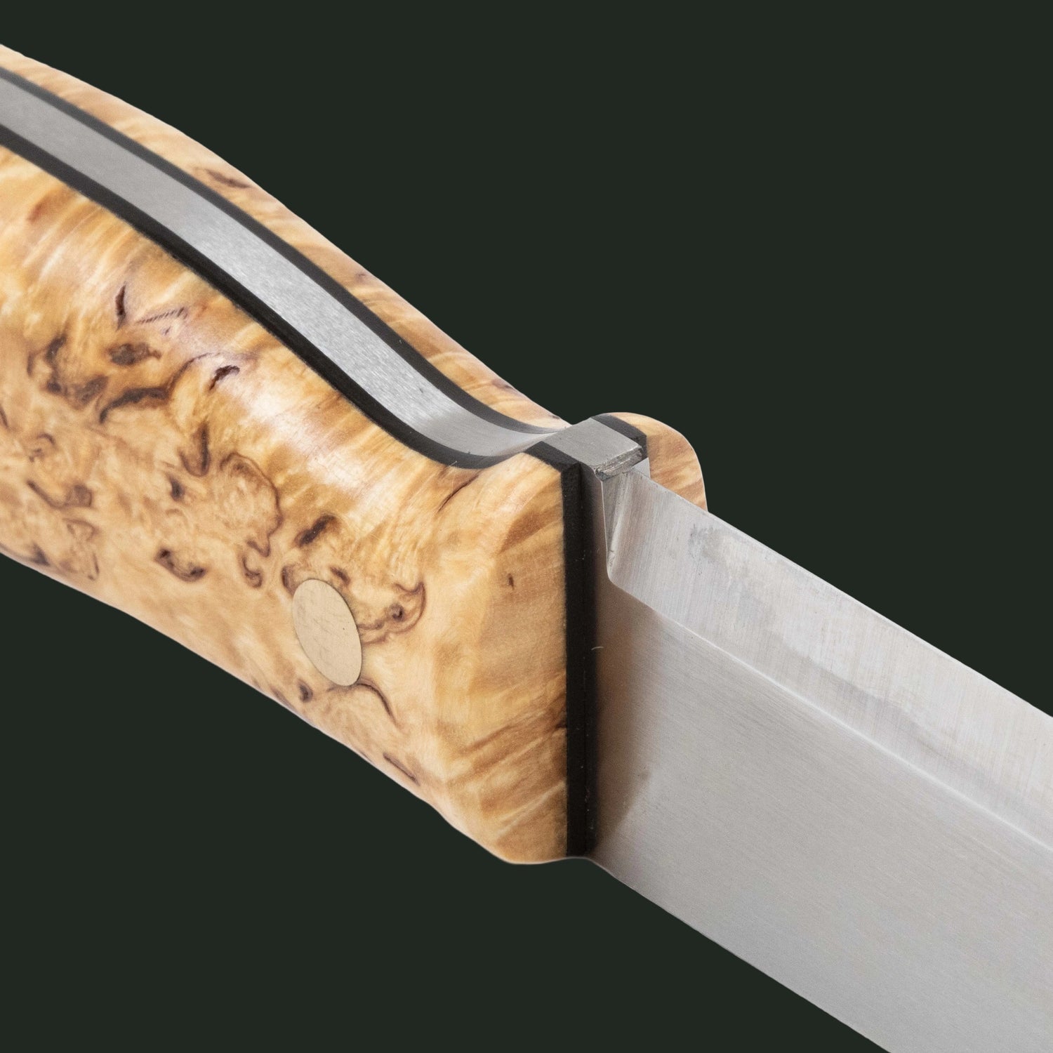 Close-up of the handle details and grind on a Casström Lars Fält knife