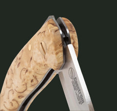 Casström Lars Fält Lock Back folding knife - half-opened, close-up of the curly birch.