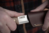 Casström No.10 Canvas Micarta - being drawn from the leather sheath