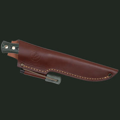 Sheathed Casström No.14 SFK with fire steel attachment displayed in a studio image on a white background.