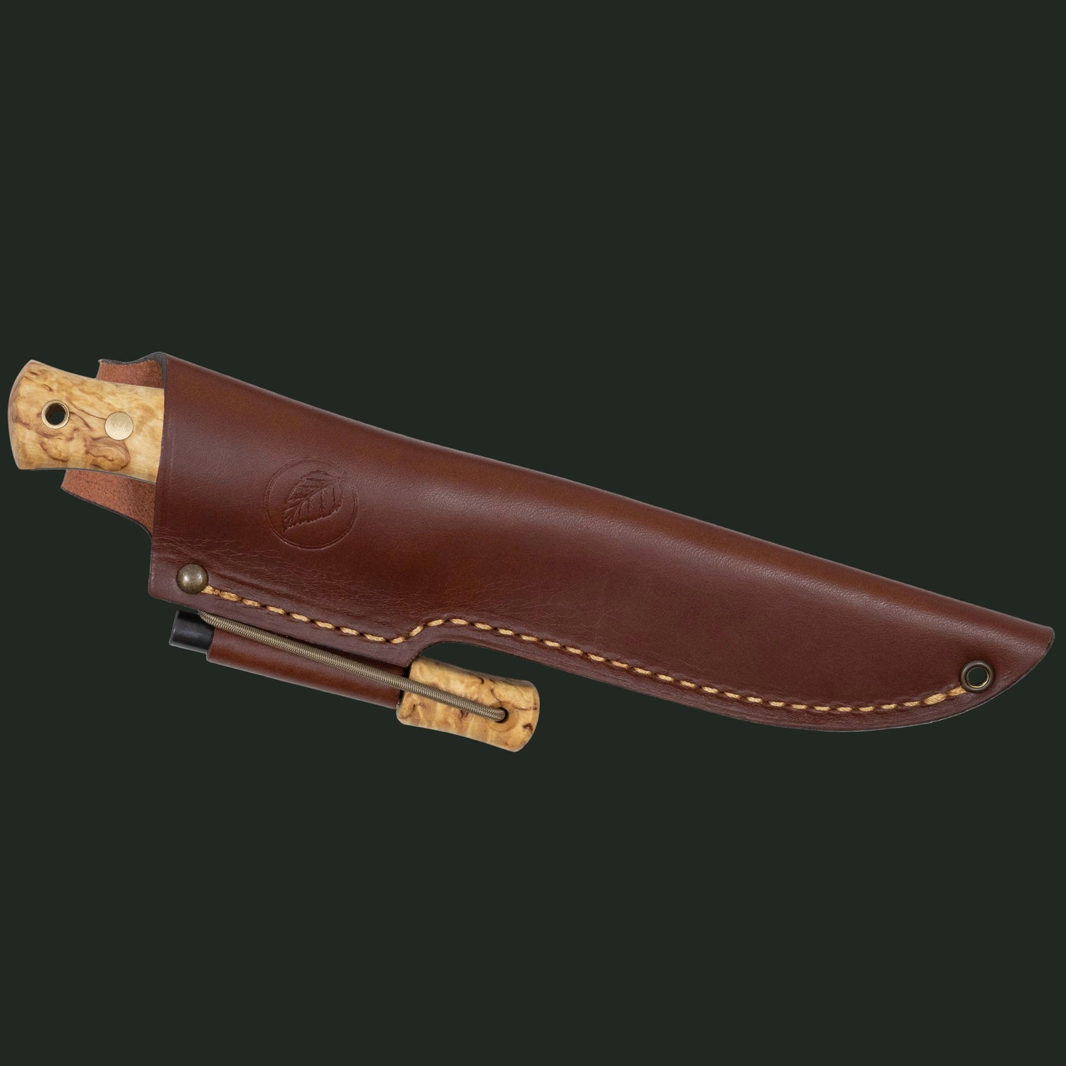Studio shot of the Casström No.14 Swedish Forest Knife fire steel version shown sheathed with integrated fire starter.