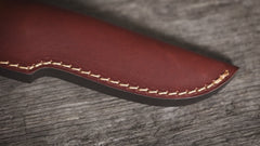 Product video of the Lars Fält bushcraft knife, detailing the features and showing the knife and leather sheath.