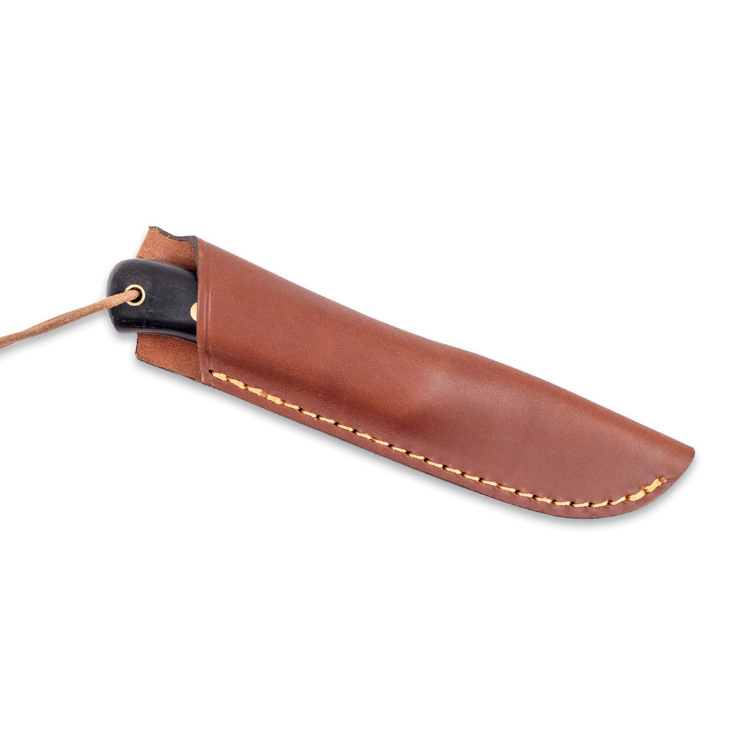 The Casstrom Woodsman survival knife in a sheath of vegetable-tanned European leather