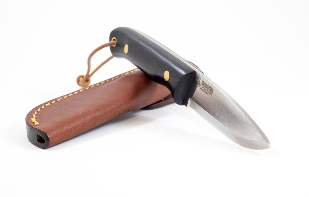 The Casstrom Woodsman bushcraft knife with bog oak handle, Scandi grind blade and leather sheath