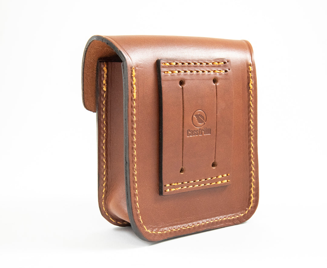 Back of the Casström Leather Possibles Pouch showing the stitched belt loop and the embossed Casström Leaf Logo