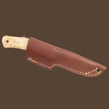 Casström No.10 SFK with curly birch handle, scandi grind and stainless steel blade. The knife is in a cognac brown leather sheath
