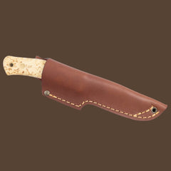 Casström No.10 SFK with curly birch handle, scandi grind and stainless steel blade. The knife is in a cognac brown leather sheath